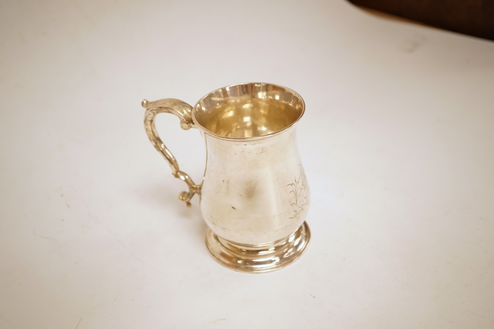 A George III silver baluster mug, by John Payne, London, 1771, height 10.2cm, 7oz.